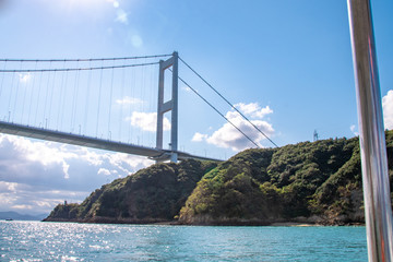 遊覧船から瀬戸内海・来島海峡大橋を眺める　The view of Setonaikai, Inland sea of Japan, and Kurushima-Kaikyo-Ohashi bridge from a pleasure boat in Imabari city, Ehime pref. Japan