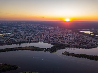 Aerial drone view. Sunset over the Dnieper River and the city of Kiev.