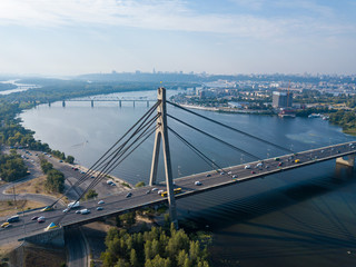 Obraz premium Aerial drone view. North bridge in Kiev and the Dnieper river on a clear summer morning.