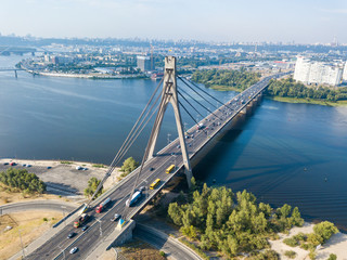 Aerial drone view. North bridge in Kiev and the Dnieper river on a clear summer morning.