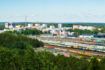 Obraz premium Kouvola, Finland - 11 June 2020: Beautiful top view from above of city Kouvola from slope Mielakka. Summer day, Finland.