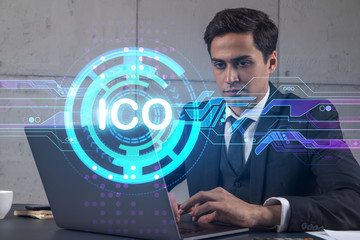 Businessman in office working with laptop technology online ico, typing computer assemble data drawing blockchain bitcoin concept. Double exposure.