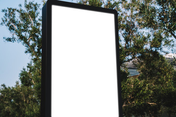 Street billboard with blank copy space screen for advertising text message or promotional content, empty mock up Lightbox for information, modern clear board poster display in public urban city street
