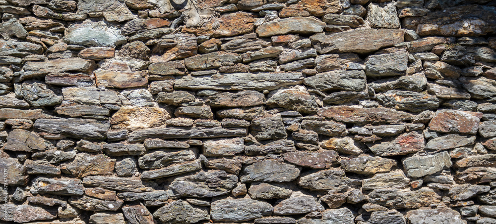 Wall mural dry stone wall background banner