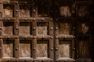 old brown wooden door with frames