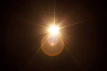 Easy to add lens flare effects for overlay designs or screen blending mode to make high-quality images. Abstract sun burst, digital flare, iridescent glare over black background.