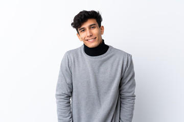 Fototapeta premium Young Argentinian man over isolated white background laughing