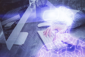 AR hologram with man working on computer on background. Augmented reality concept. Double exposure.