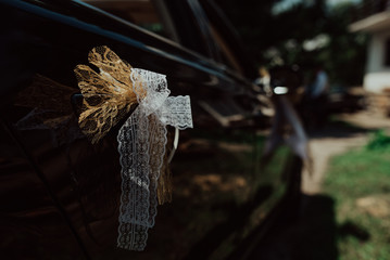 Luxury wedding car decorated with flowers