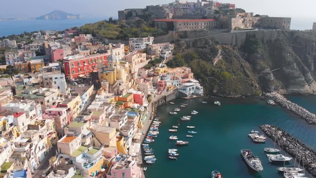 Aerial view of traditional Corricella fisherman village in Procida, island near Naples, Italy