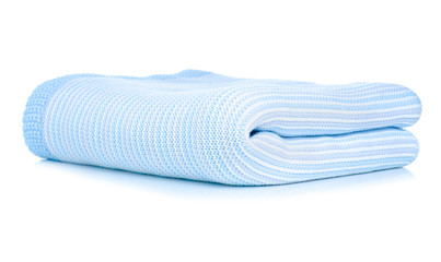folded blue warm plaid blanket on white background isolation