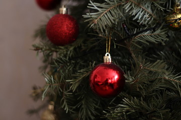 red christmas balls on christmas tree