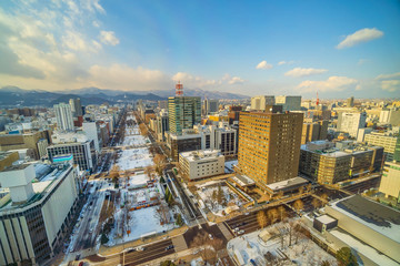 Sapporo city downtown skyline cityscape of Japan sunset - obrazy, fototapety, plakaty