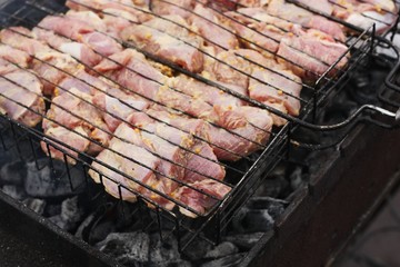 Pork meat with spices on a barbecue grill