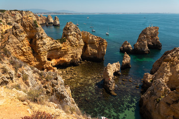 Coves and cliffs at Ponta da Piedade the most famous spot of Algarve region, in Portugal.