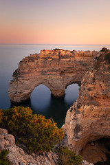 Fototapeta na wymiar Praia da Marinha cove with the famous heart formation of the natural archs at Algarve, Portugal.