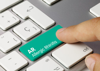 AR Allergic rhinitis - Inscription on Green Keyboard Key.
