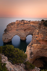 Praia da Marinha cove with the famous heart formation of the natural archs at Algarve, Portugal.