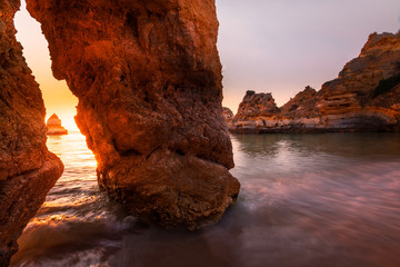 Fototapeta na wymiar Coves and cliffs at Ponta da Piedade the most famous spot of Algarve region, in Portugal.