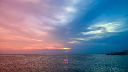 Red and blue sunset on the coast