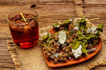 Dry leaves, flowers and berries of raspberry for cooking healthy herbal tea