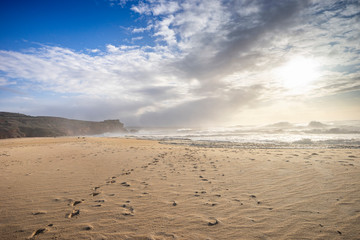Restless sea at North Beach of famous Nazare, Portugal
