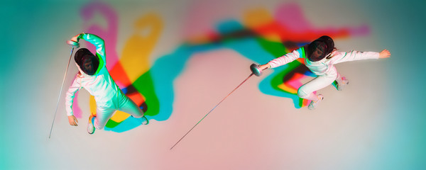 Collage of 1 teen girl in fencing costume with sword in hand on gradient background in neon light. Top view. Young model practicing, training in motion, action. Copyspace. Sport, youth, healthy