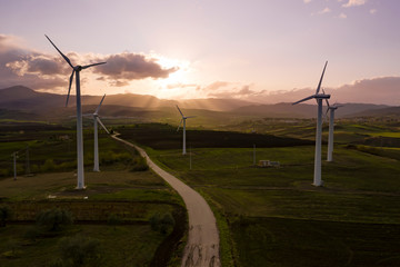 Wind turbines at the sunset