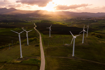 Wind turbines at the sunset