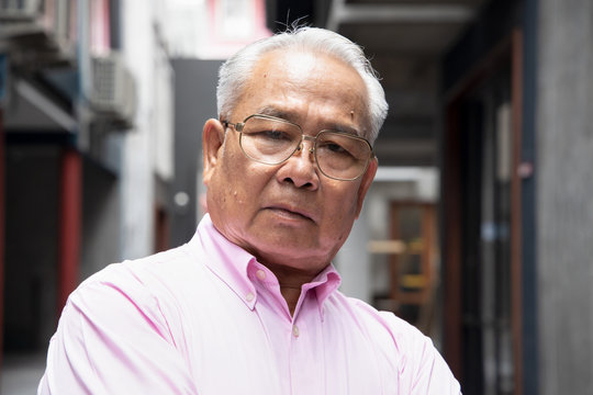 stressed, angry asian old senior man