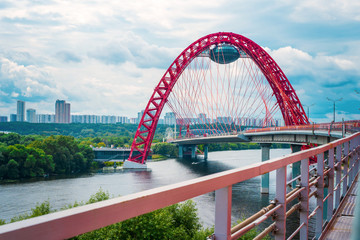 Red suspended bridge construction in Moscow. 