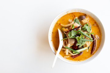 Tom Yum mushroom in bowl on white table background