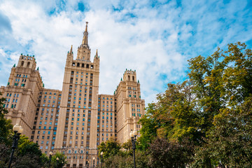 Fototapeta na wymiar Old high-rise building in the center of Moscow, panorama of the city street in summer