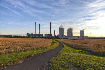 Fototapeta na wymiar Thermal power plant with grain field, Czech Republic 