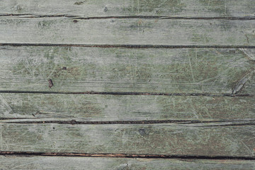 Old gray and green wooden tiles, board. Rough aged wood panels, texture background. 