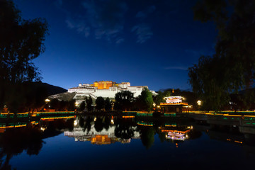 Lhasa ex Tibet now China, Chengguan District The Potala Palace, night view with reflection on the...