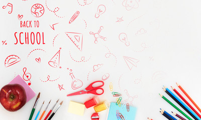 Colorful school supplies corner border over a white background with words Back to school. Pencils, paints, scissors, stickers. Education, school time, childhood concept. Copyspace, ready for ad.