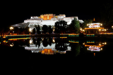 Lhasa ex Tibet now China, Chengguan District The Potala Palace, night view with reflection on the...