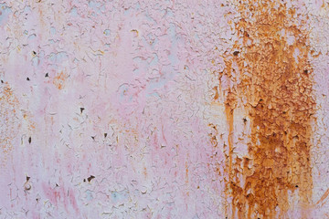 abstract pink paint texture on rusty metal
