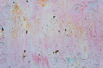 abstract pink paint texture on rusty metal