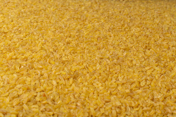 Bulgur, Bulgour or Bulghur Grains Texture Background