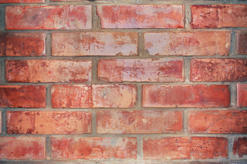 Naklejka premium Red brick wall. background texture.