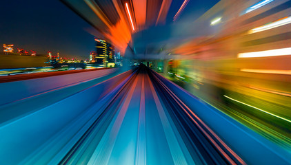 Abstract high speed technology POV train motion blurred concept from the Yuikamome monorail in Tokyo, Japan - obrazy, fototapety, plakaty