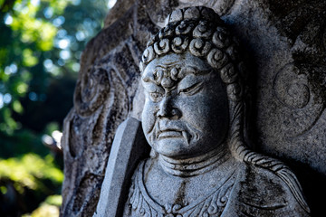 A statue of God at Meguro fudo temple in Tokyo