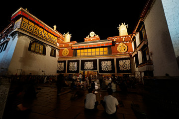 Lhasa ex Tibet now China, Chengguan District, Lhasa, Tibet, China,   procession of faithful praying...