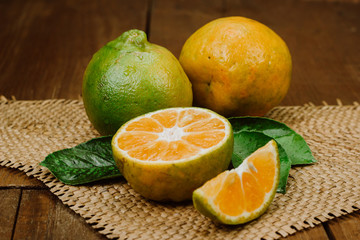 Fototapeta na wymiar oranges on a wooden table