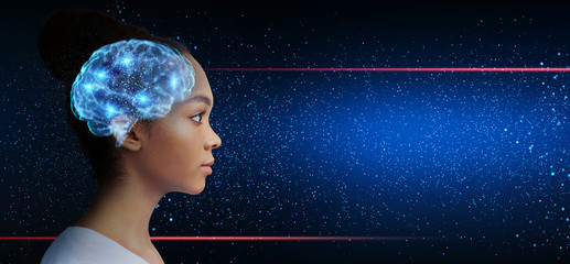 Intelligent asian girl with illuminated brain looking at free space