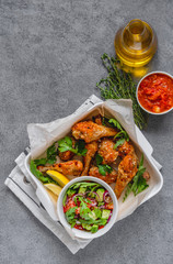 Baked chicken drumsticks in the oven.