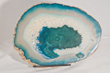 front view, close distance of a slice of blue, white crystal