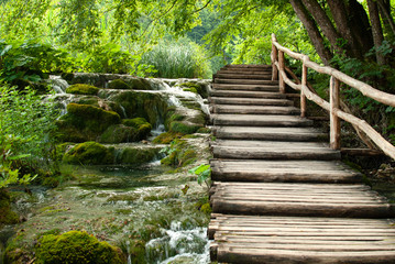 Wooden path and waterfall